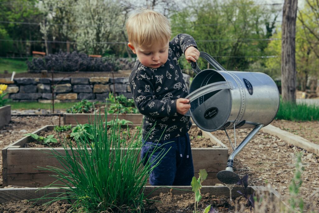 Creating a productive garden in any space is so simple with the right plan, this little boy is determined to help too.
