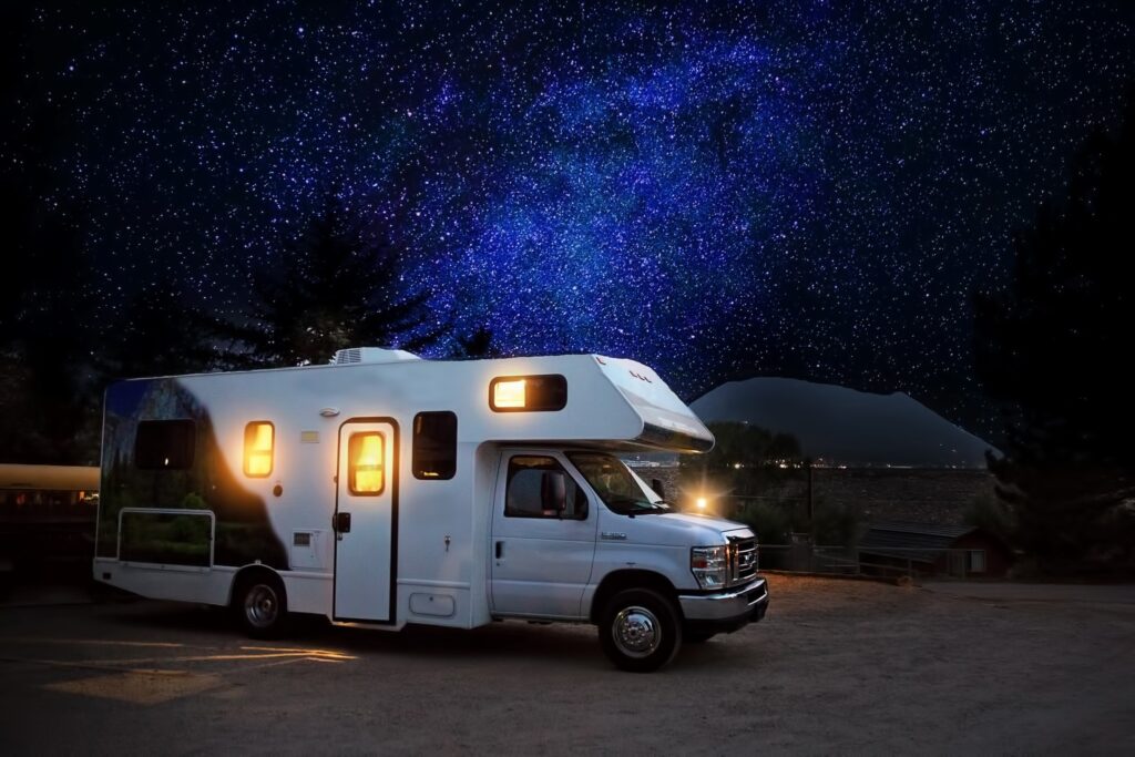 RV camping under the stars with lights bright thanks to their reliable batteries